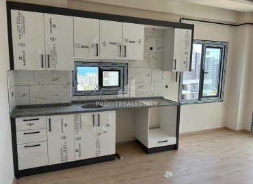 Новая квартира с одной спальней, 55м², в резиденции с минимальной инфраструктурой у моря, в районе Мерсина – Тедже. ID-14311 фото-6