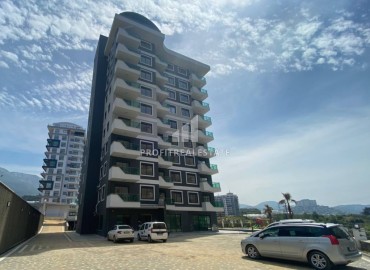 Меблированная двухкомнатная квартира 54м2, с видом на горы, в комплексе с инфраструктурой, Махмутлар, Аланья ID-14322 фото-1