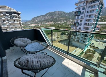Furnished one-bedroom apartment 54m2, with mountain views, in a residence with facilities, Mahmutlar, Alanya ID-14322 фото-14