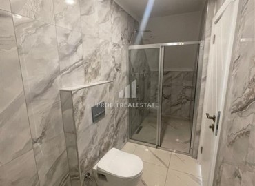 Three-bedroom view penthouse, 135m2, unfurnished, in a new residential residence, 200 meters from the beach in the center of Alanya ID-14323 фото-8