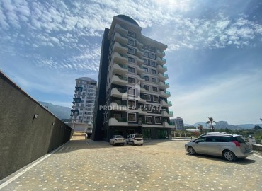 Элегантная меблированная квартира с видом на море, планировки 1+1, 49м2, в комплексе с инфраструктурой, Махмутлар, Аланья ID-14324 фото-1