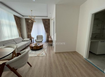 Elegant furnished apartment with a sea view, layout 1 + 1, 49m2, in a residence with facilities, Mahmutlar, Alanya ID-14324 фото-3