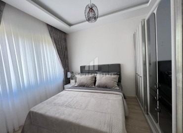 Elegant furnished apartment with a sea view, layout 1 + 1, 49m2, in a residence with facilities, Mahmutlar, Alanya ID-14324 фото-5