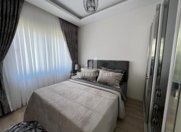 Elegant furnished apartment with a sea view, layout 1 + 1, 49m2, in a residence with facilities, Mahmutlar, Alanya ID-14324 фото-6