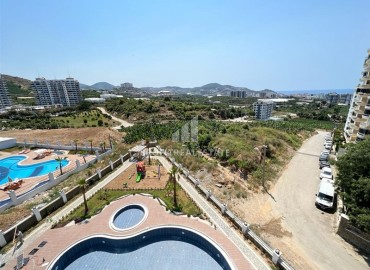 Elegant furnished apartment with a sea view, layout 1 + 1, 49m2, in a residence with facilities, Mahmutlar, Alanya ID-14324 фото-18