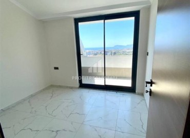 Sea view penthouse, 100m2, with three bedrooms, in a new residential residence with facilities, Mahmutlar, Alanya ID-14340 фото-2