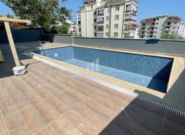New one-bedroom apartment 40m2, at a very attractive price, unfurnished, with kitchen, Avsallar, Alanya ID-14351 фото-5