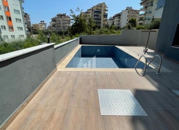 New one-bedroom apartment 40m2, at a very attractive price, unfurnished, with kitchen, Avsallar, Alanya ID-14351 фото-10