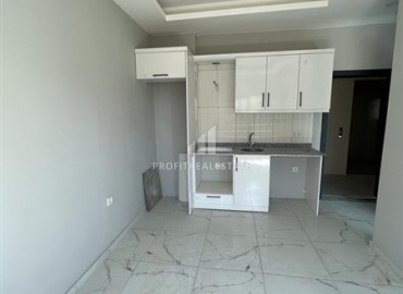 Новая двухкомнатная квартира 40м2, по очень привлекательной цене, без мебели, с кухонным гарнитуром, Авсаллар, Аланья ID-14351 фото-12