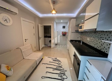 Cozy furnished apartment 1 + 1, 42m², with a glazed balcony, 300m from the sea in Oba, Alanya ID-14368 фото-2