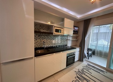Cozy furnished apartment 1 + 1, 42m², with a glazed balcony, 300m from the sea in Oba, Alanya ID-14368 фото-6