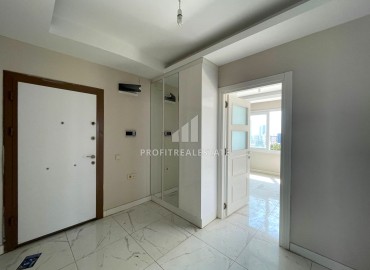Two bedroom apartment, 130m², in an urban-type house with a parking 450m from the sea in Tej, Mersin ID-14397 фото-2