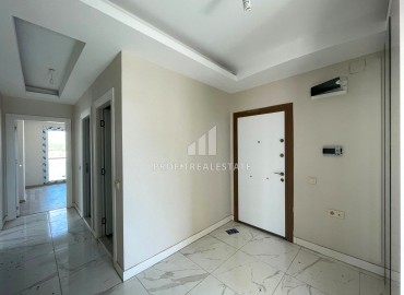Two bedroom apartment, 130m², in an urban-type house with a parking 450m from the sea in Tej, Mersin ID-14397 фото-3