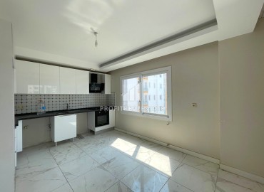 Two bedroom apartment, 130m², in an urban-type house with a parking 450m from the sea in Tej, Mersin ID-14397 фото-5