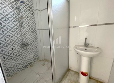 Two bedroom apartment, 130m², in an urban-type house with a parking 450m from the sea in Tej, Mersin ID-14397 фото-15