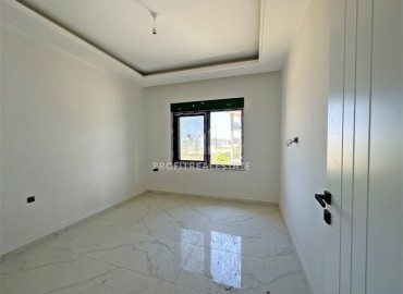 Двухкомнатная квартира 46 м2, с видом на море, без мебели, в новой жилой резиденции в Каргыджаке, Аланья ID-14409 фото-1