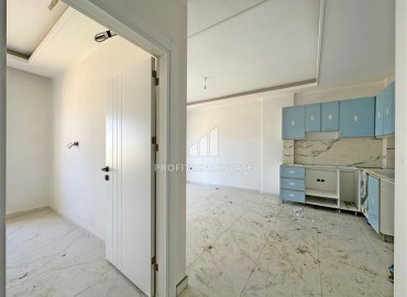 Двухкомнатная квартира 46 м2, с видом на море, без мебели, в новой жилой резиденции в Каргыджаке, Аланья ID-14409 фото-4