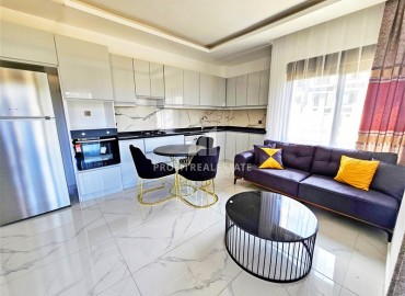 Меблированная трехкомнатная квартира 85м2, со стильным интерьером, в 300 метрах от моря, Каргыджак, Аланья ID-14410 фото-1