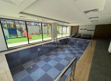 Двухкомнатная квартира, 55м², с чистовой отделкой в новом комплексе премиум класса в районе Авсаллар, Алания ID-14413 фото-17