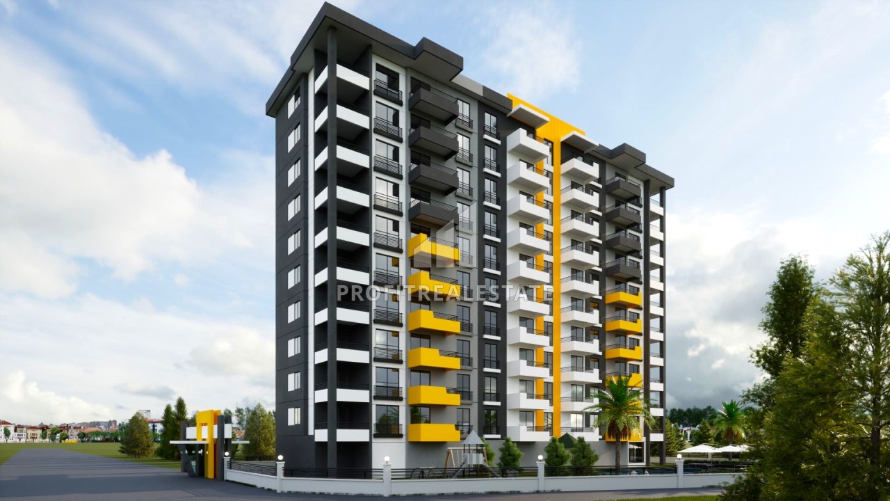 Двухкомнатные квартиры, 65м², в комплексе на этапе строительства в 500м от моря в Эрдемли, Арпачбахшиш ID-14416 фото-2