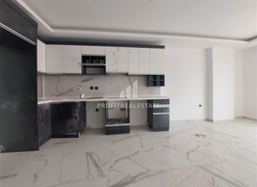 Inexpensive unfurnished one-bedroom apartment, 58m2, in a new residential residence with facilities, Mahmutlar, Alanya ID-14424 фото-6