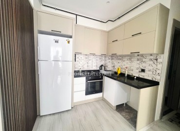 Two bedroom apartment, 90m², in a new residence with a swimming pool, in the area of Mersin - Mezitli ID-14432 фото-4