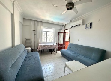 Недорогая меблированная квартира с одной спальней, 55м², в доме городского типа в Махмутларе, Алания ID-14433 фото-4
