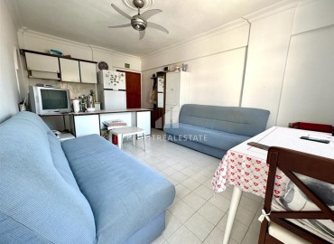 Недорогая меблированная квартира с одной спальней, 55м², в доме городского типа в Махмутларе, Алания ID-14433 фото-5