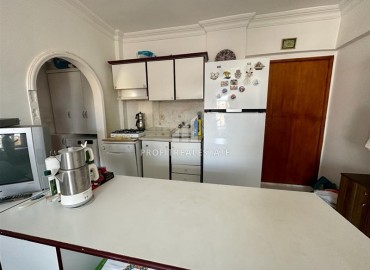 Недорогая меблированная квартира с одной спальней, 55м², в доме городского типа в Махмутларе, Алания ID-14433 фото-8
