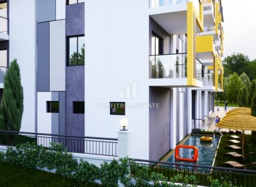 Двухкомнатные квартиры, 59м², в комплексе на этапе строительства в 350м от моря в районе Мерсина - Эрдемли. ID-14451 фото-4