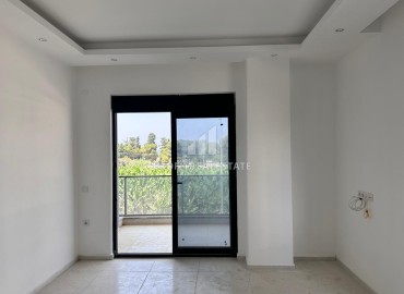Двухкомнатные апартаменты, 51м², на окончательном этапе строительства, в 150м от моря в районе Каргыджак, Алания ID-12512 фото-8