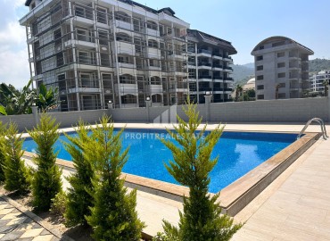 Двухкомнатные апартаменты, 51м², на окончательном этапе строительства, в 150м от моря в районе Каргыджак, Алания ID-12512 фото-12