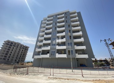 Апартаменты 2+1, 110м², в комплексе с бассейном на этапе строительства в районе Томюк, Мерсин ID-14467 фото-1