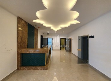 Двухкомнатная квартира, 56м², на высоком этаже элитной новостройки Махмутлара, в 650м от моря, Алания ID-14476 фото-17