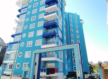 Меблированная двухкомнатная квартира 65м2, с дизайнерским интерьером, в 500 метрах от моря, Махмутлар, Аланья ID-14481 фото-1