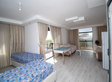 Квартира с двумя спальнями, 100м², с отдельной кухней, в 500м от моря в районе Алании Демирташ ID-14490 фото-5
