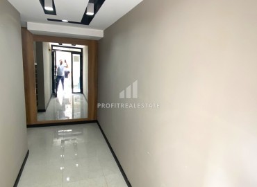 Compact one-bedroom apartment, 50m², in an urban-type house in Ciftlikkoy, Yenishehir district, Mersin ID-14498 фото-3