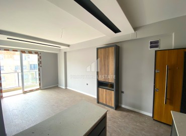 Compact one-bedroom apartment, 50m², in an urban-type house in Ciftlikkoy, Yenishehir district, Mersin ID-14498 фото-7