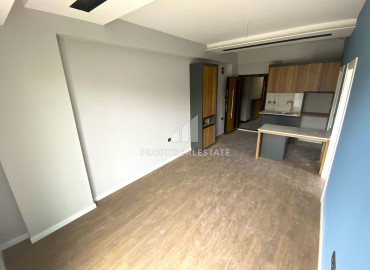 Компактная квартира с одной спальней, 50м², в доме городского типа в Чифтликкёй, район Енишехир, Мерсин ID-14498 фото-8