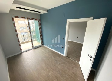 Compact one-bedroom apartment, 50m², in an urban-type house in Ciftlikkoy, Yenishehir district, Mersin ID-14498 фото-11