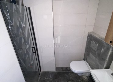 Compact one-bedroom apartment, 50m², in an urban-type house in Ciftlikkoy, Yenishehir district, Mersin ID-14498 фото-14