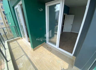 Compact one-bedroom apartment, 50m², in an urban-type house in Ciftlikkoy, Yenishehir district, Mersin ID-14498 фото-16