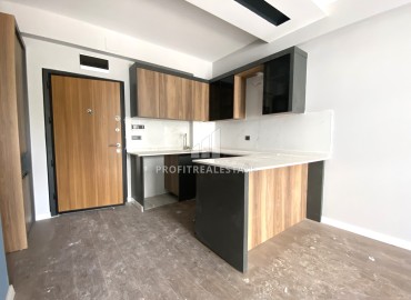 Трехкомнатная квартира, 85м², в новом доме городского типа в центре района Енишехир, Мерсин ID-14503 фото-5