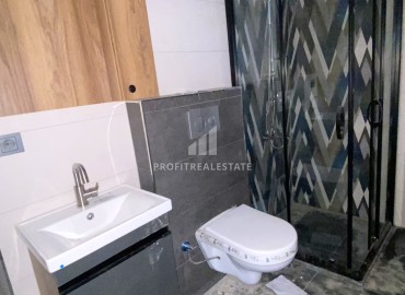 Two bedroom apartment, 85m², in a new urban-type building in the center of Yenishehir, Mersin ID-14503 фото-15