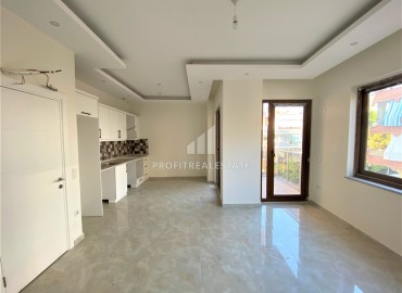 New apartment 2 + 1 150 meters from the sea, in a house without a pool, Alanya center, 70 m2 ID-14507 фото-3