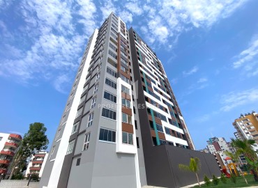 Двухкомнатные апартаменты, 55м² в новостройке с хорошей локацией в районе Енишехир, Чифтликкёй ID-14514 фото-1