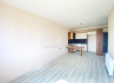 One bedroom apartment, 55m² in a new building with a good location in Yenishehir, Ciftlikkoy ID-14514 фото-5