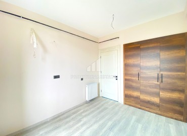 Двухкомнатные апартаменты, 55м² в новостройке с хорошей локацией в районе Енишехир, Чифтликкёй ID-14514 фото-9