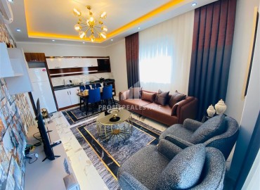 Двухкомнатные апартаменты с дизайнерским интерьером, 58м², в новом комплексе премиум класса в Махмутларе, Алания ID-14521 фото-5