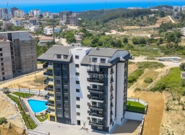 One-bedroom furnished apartment 65 m2, with a private garden, in a residence with facilities in Avsallar, Alanya ID-14553 фото-1